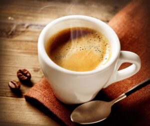 photo of cup of coffee how to get the lowest life insurance premiums